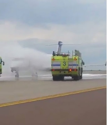 United Airlines plane lands at Denver International Airport with engine on fire