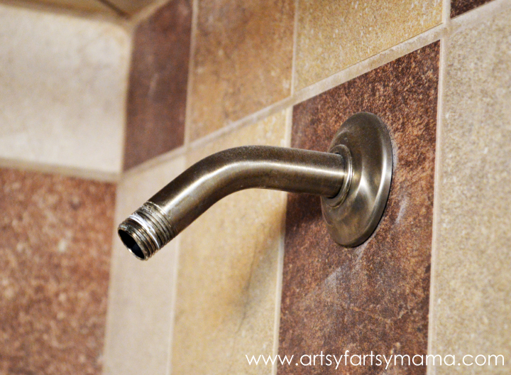 How to Replace a Shower Head at artsyfartsymama.com #DIY #bathroom #shower #Moen