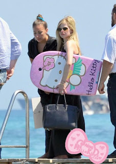 Avril Lavigne and Hello Kitty Bodyboard at the beach