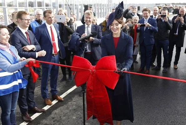 Crown Princess Mary officially opened Crown Princess Mary's Bridge in Roskilde.She is wearing blue coat and dolce Gabbana dress