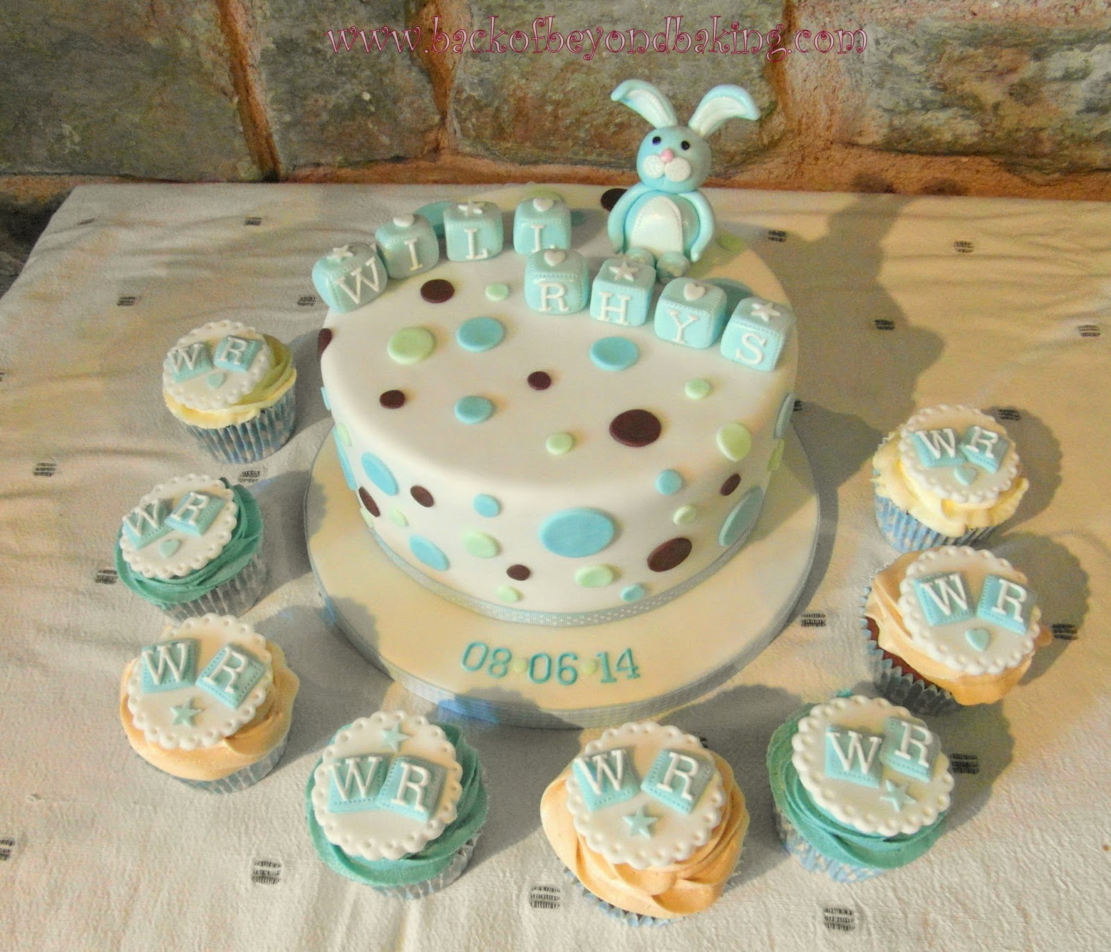 Christening cake and matching cupcake