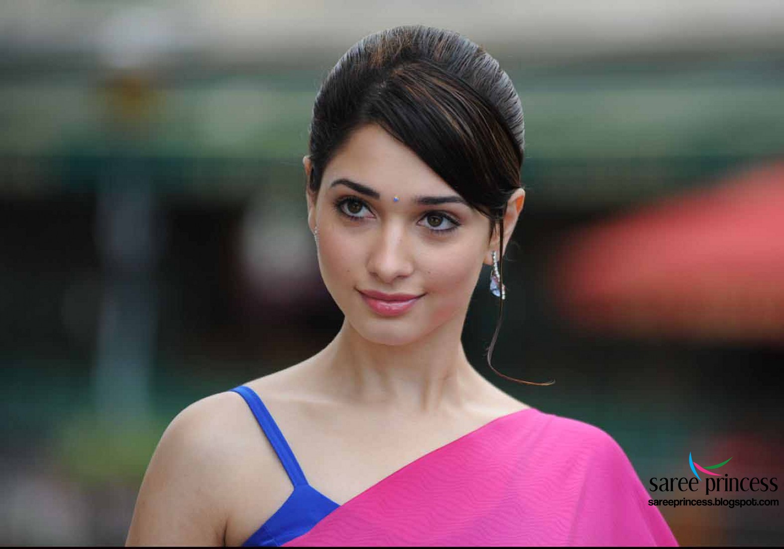 Indian actress tamanna sizzling hot in a pink chiffon saree
