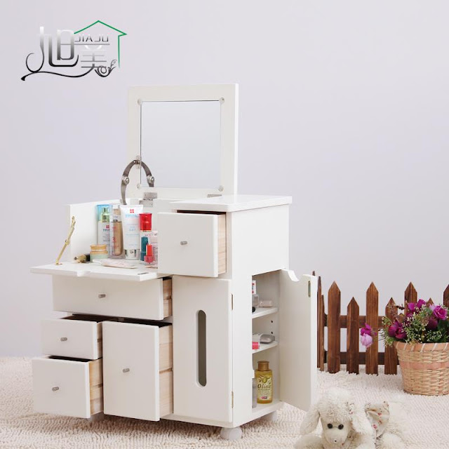 functional very small dressing table with plenty of drawers and folding mirror