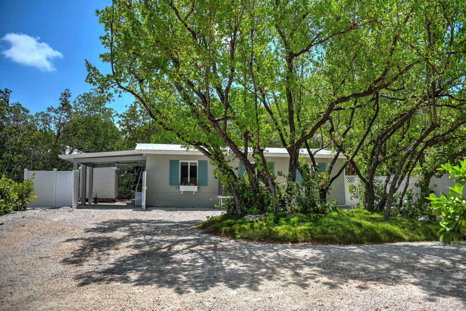 Real Estate in the Florida Keys CBS canal front cottage on oversized lot 600K