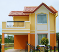 modelo de casa de dos pisos colores amarillo y naranjo