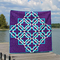 http://www.sliceofpiquilts.com/2018/11/turning-tiles-in-mccalls-quilting.html