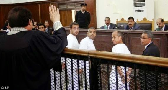 2 Egypt court orders release of al-Jazeera journalists Fahmy and Mohamed on bail