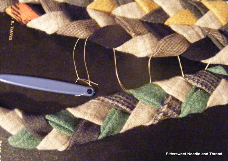 Bittersweet Needle and Thread Wool Braided Rug and Willow Basket