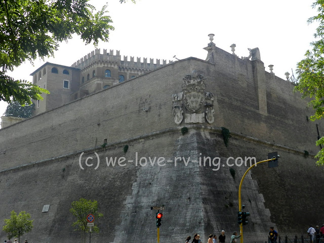 We stand across the street from the Vatican but see little more than the wall that surrounds it.