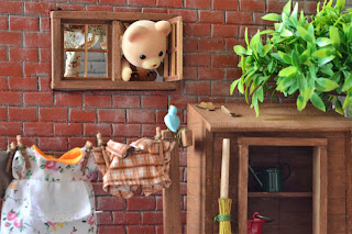 Sylvanian Families brother Aidan Osborne bear says hello to little blue bird Sylvanian Families brother Aidan Osborne bear says hello to little blue bird