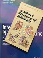 A Short History of Biology, by Isaac Asimov, superimposed on Intermediate Physics for Medicine and Biology.