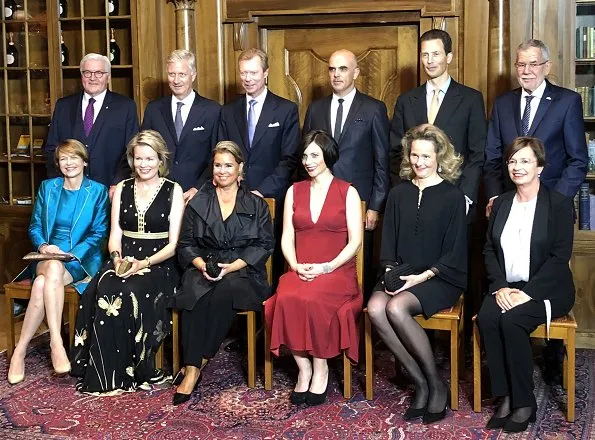 Queen Mathilde wore Diane von Furstenberg Vivanette gown, Giorgio Armani duster coat at Hotel Waldhaus in Sils Maria