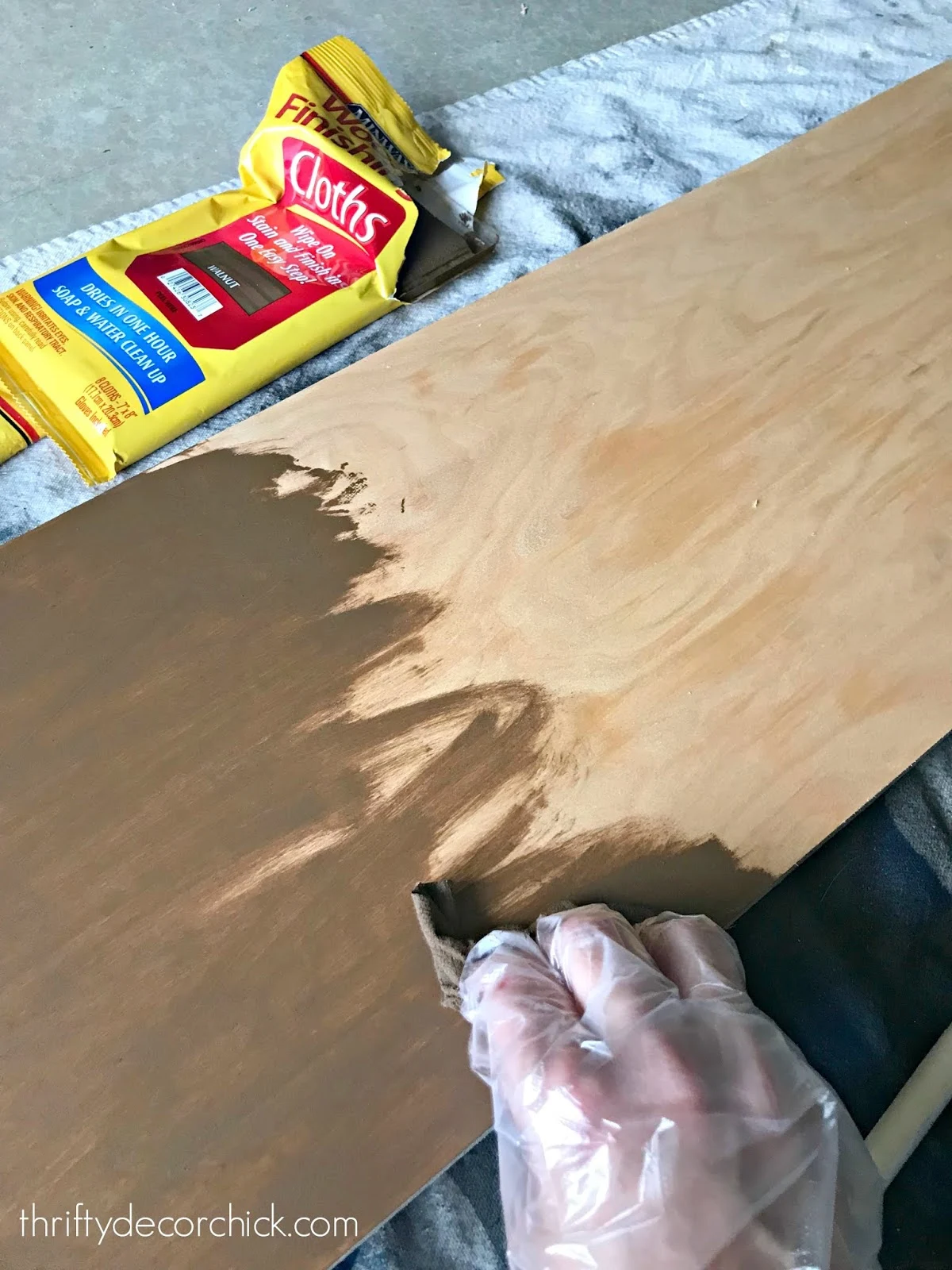 Staining wood with wipes