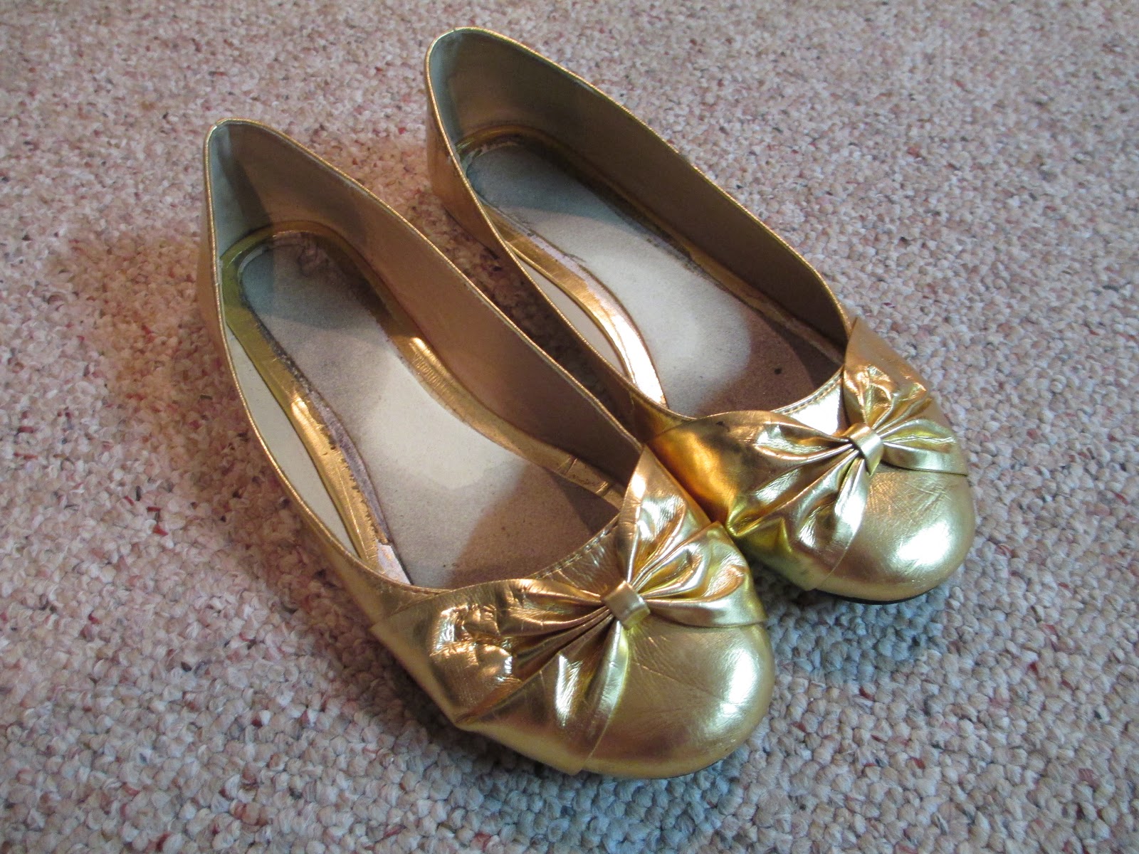 Trashed and Abused Shoes Destroying the Gold Ballet Flats