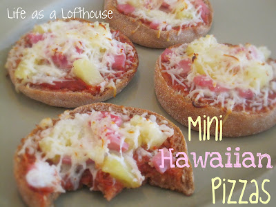 Mini Hawaiian Pizzas are little pizzas covered in a homemade pizza sauce and topped with cheese, pineapple tidbits and Canadian ham. Life-in-the-Lofthouse.com