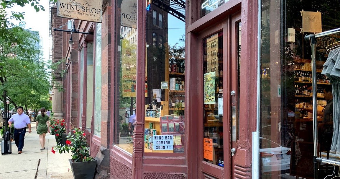 Sloopin A South Loop Blog "Wine Bar Coming Soon" Sign in Window of