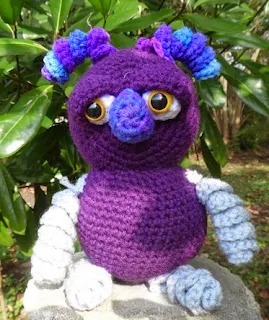 http://www.craftsy.com/pattern/crocheting/toy/emma-doodlebug/79386