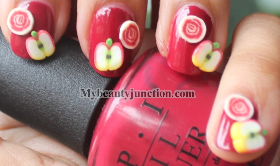 Fimo manicure on O.P.I. From A To Zurich nail polish Cosmetopia