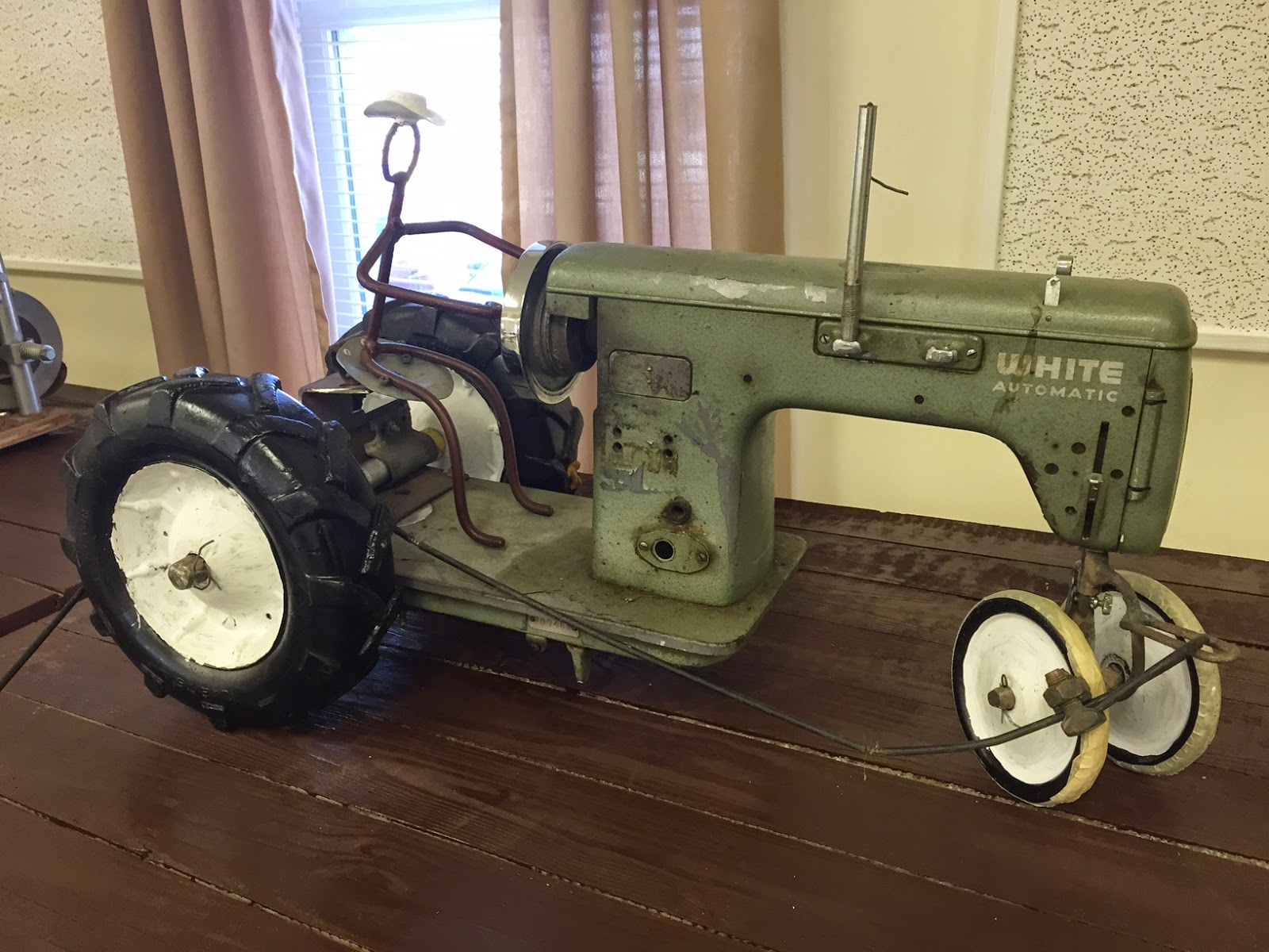A tractor made from a sewing machine, crafted by Ivan Dodds of rural Butler...
