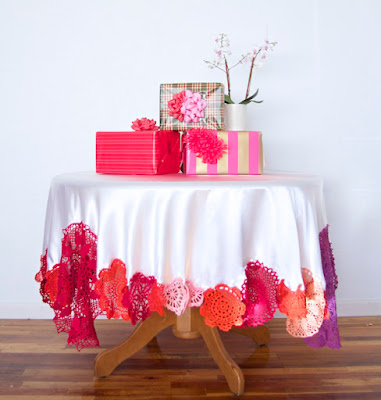 http://asubtlerevelry.com/colorful-crochet-tablecloth