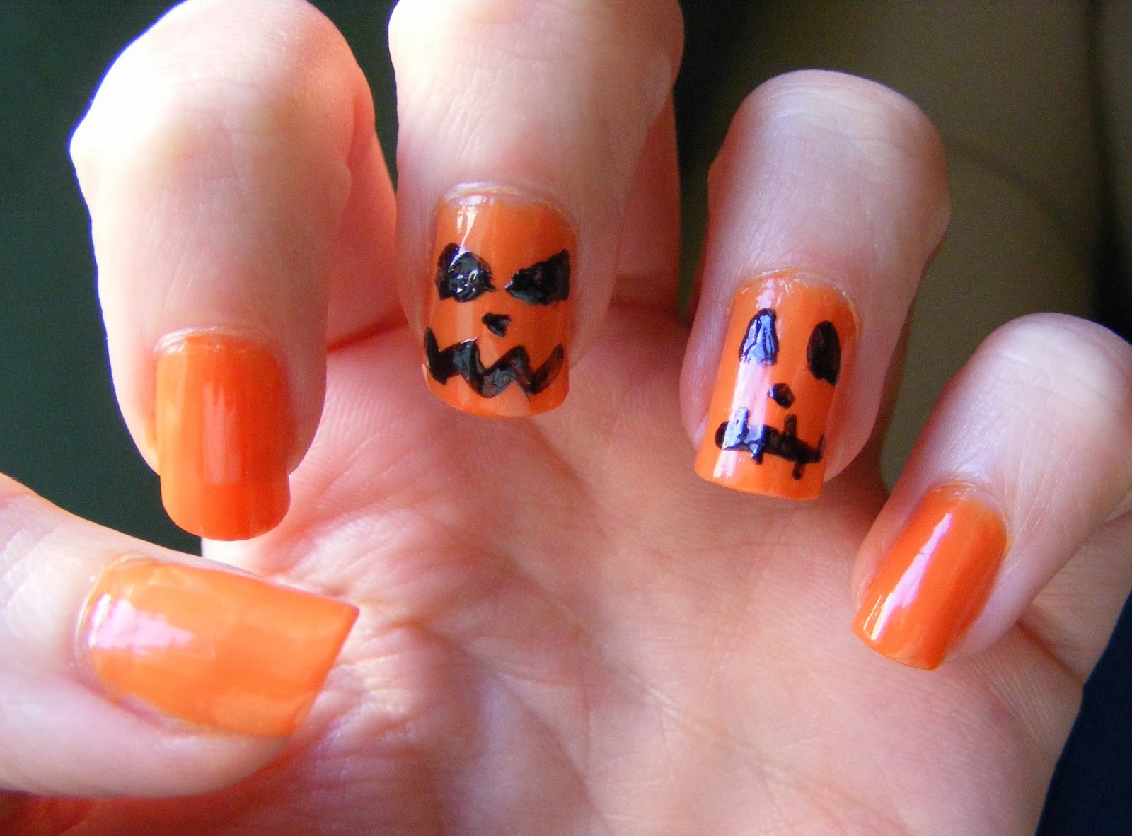 5. "Glow in the Dark Jack O Lantern Nail Design" - wide 10