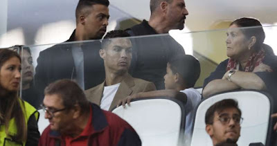 Juventus forward Cristiano Ronaldo © Associated Press Juventus forward Cristiano Ronaldo, center, flanked by his girlfriend Georgina, left, looks at his son Cristiano Jr, as his mother Dolores Aveiro sits at right, during a Champions League, group H soccer match between Juventus and Young Boys, at the Allianz stadium in Turin, Italy, Tuesday, Oct. 2, 2018. A lawyer for a Nevada woman alleging that soccer star Cristiano Ronaldo raped her in Las Vegas in 2009 said Tuesday her client was "emotionally fragile" and agreed to an out-of-court financial settlement nine years ago because she never wanted her name made public. (AP Photo/Luca Bruno)
