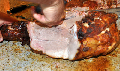 carving meat off the bone