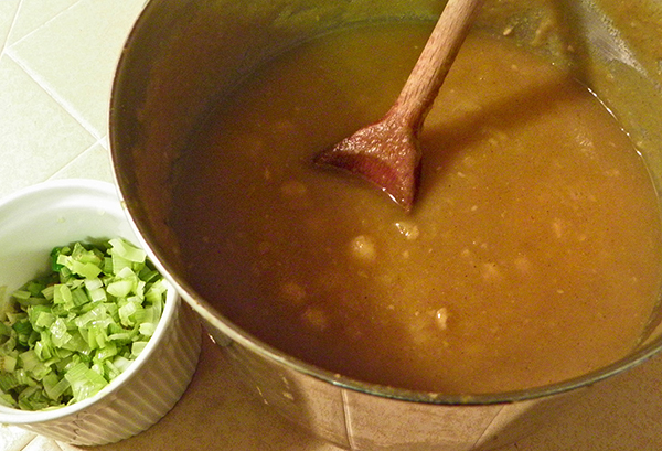 pot of Moroccan pumpkin soup and small dish of sauteed leeks