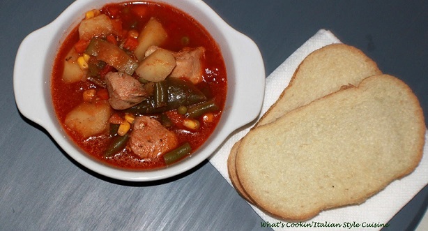 this is a stew made with all fresh vegetables and burgundy wine.  this is an easy Chicken  stew in a microwaveable white corning ware dish and Italian bread on the side