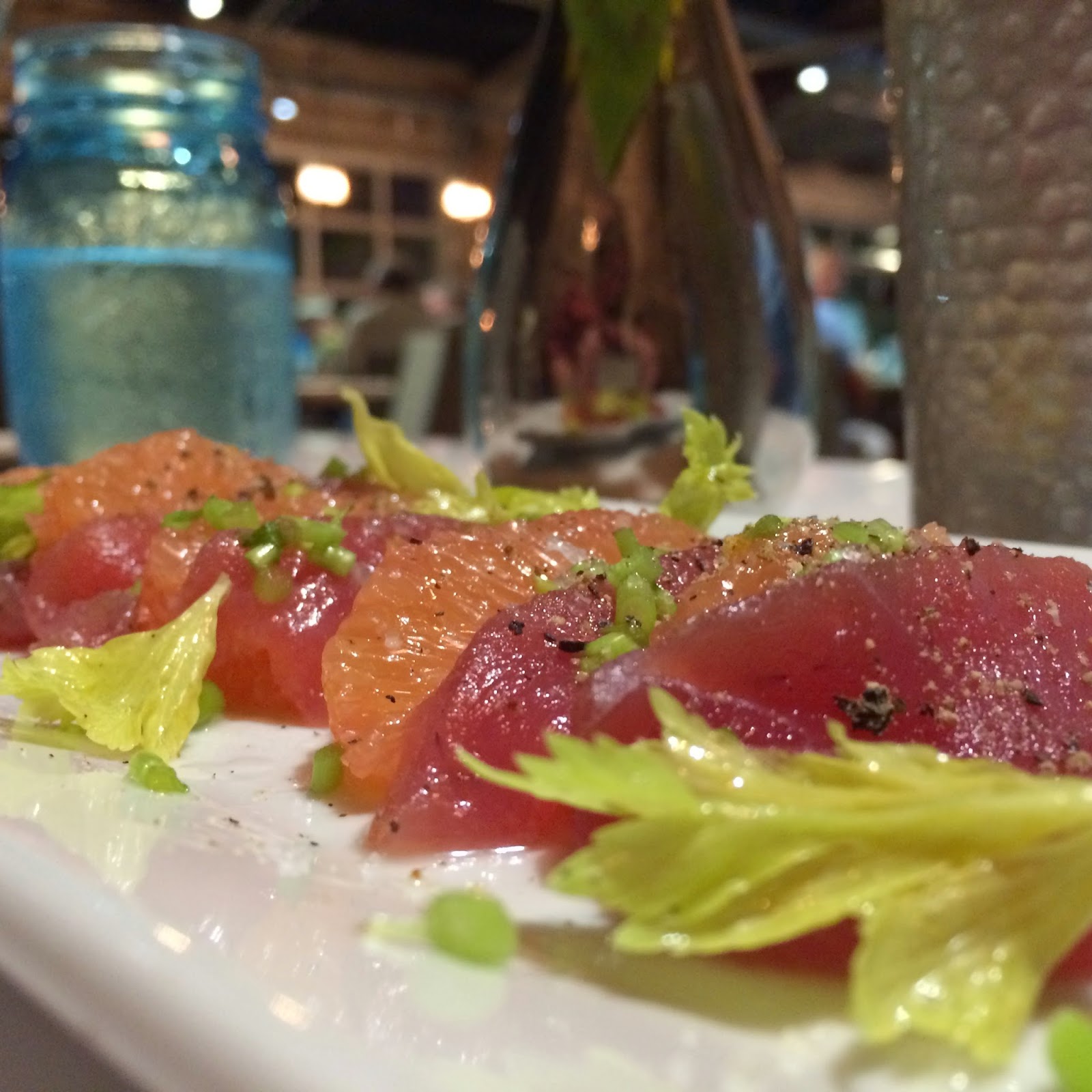Tiled Fresh Tuna and Grapefruit Slices with Celery Stems at Lucy B. Goode in Gulf Shores