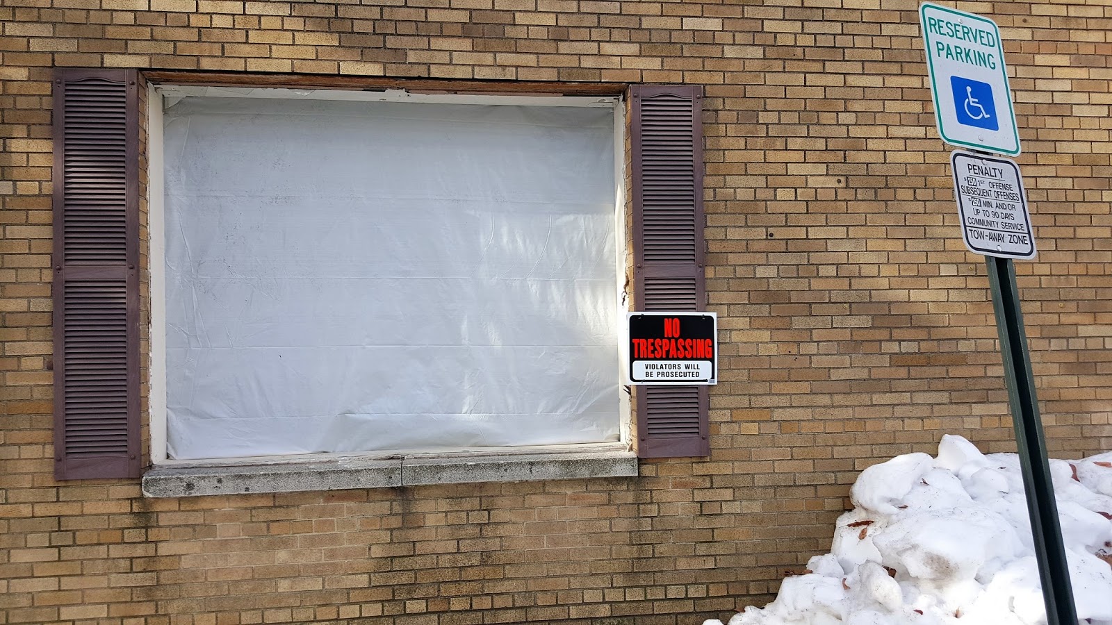 POST OFFICE WINDOW REMOVAL INCLUDES ASBESTOS; NOT SECURED