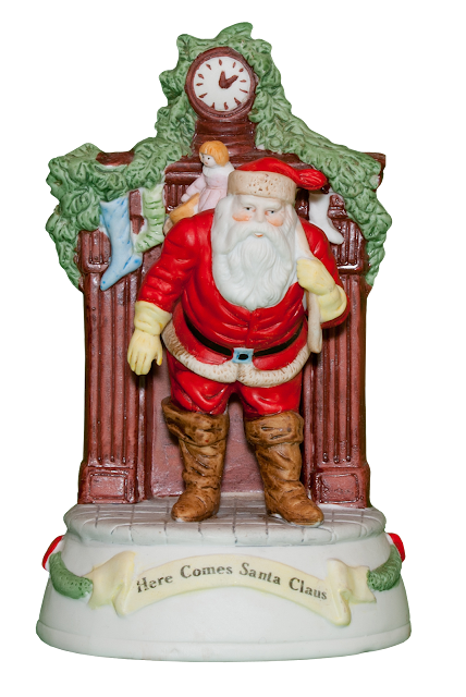 A china music box that plays "Here Comes Santa Clause" when the key underneath is wound.