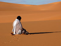 Man praying in Desert