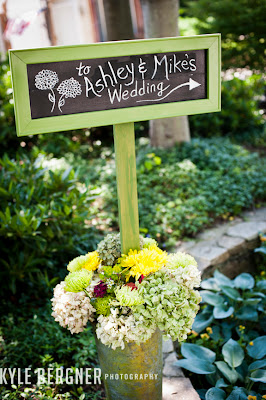 Hand drawn garden wedding sign with florals by DellaBlooms