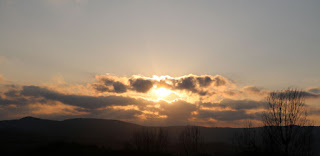 The sun goes down, above the men's village The sun goes down, above the men's village
