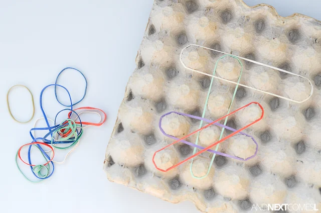 Fine motor activity for kids using a homemade egg carton geoboard from And Next Comes L