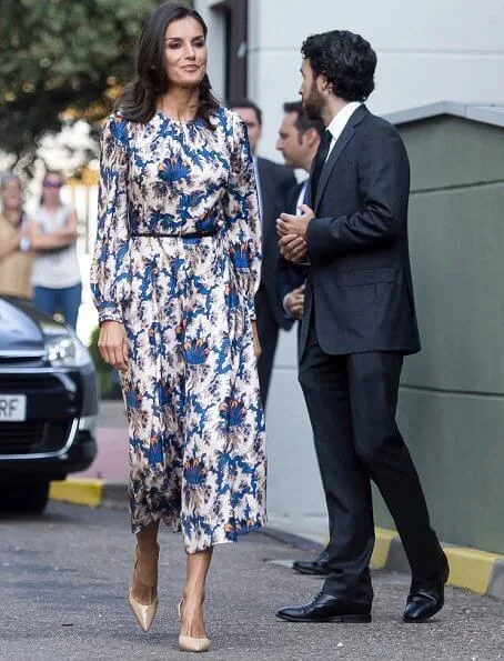 Queen Letizia wore Sandro all-over print long silk dress. Queen Letizia wore Carolina Herrera nude patent leather slingback pumps