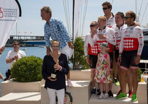 Prince Albert and Princess Charlene attended Riviera Water Bike Challenge at Monaco Yacht Club. Princess Charlene a injury in her wrist.