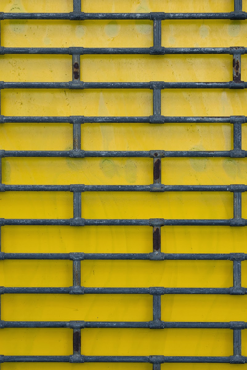 yellow wall with grid