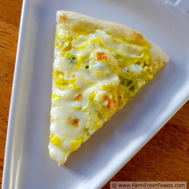image of a slice of Easy Chile Relleno Pizza on a triangle-shaped plate.