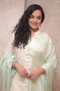 nitya menon at 100 days of love audio launch nitya menon at 100 days of love audio launch