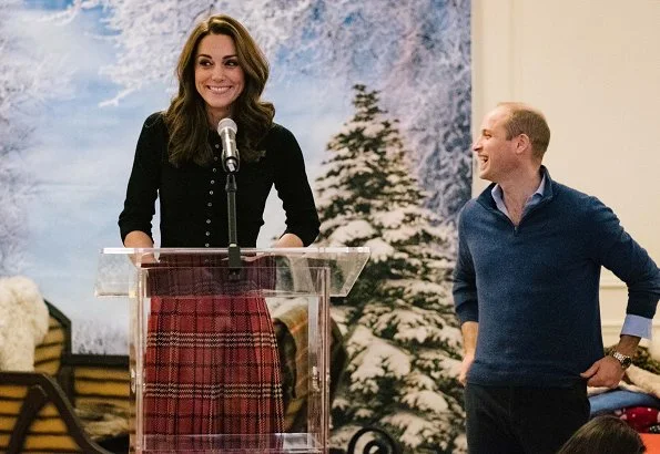 Kate Middleton wore Emilia Wickstead tartan pleated skirt. The Duchess wore a new cashmere cardigan by Brora