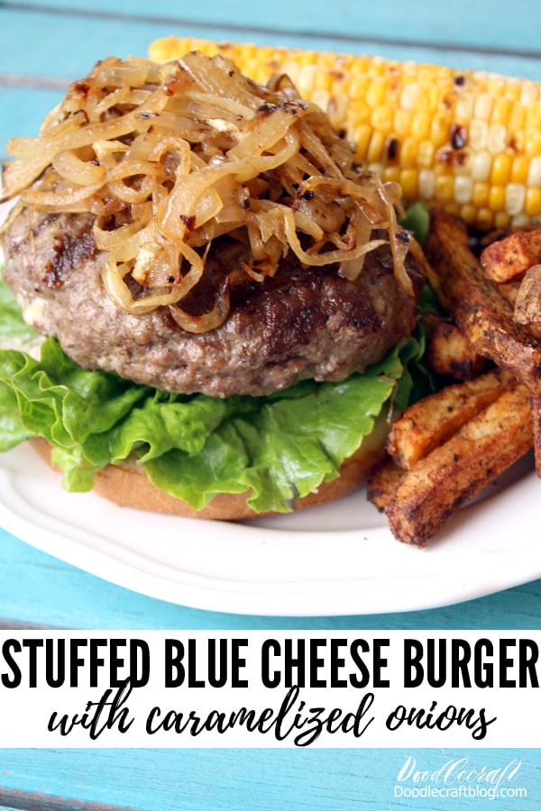 Delicious hamburger stuffed with blue cheese and grilled to perfection, topped with caramelized onions and served with grilled corn and french fries cooked in an air fryer.