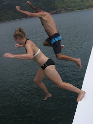 Father and daughter jumping 5 meters into the refreshing South China Sea.