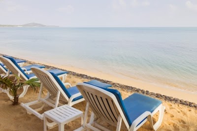 Beach Chairs At An Empty Beach In Thailand