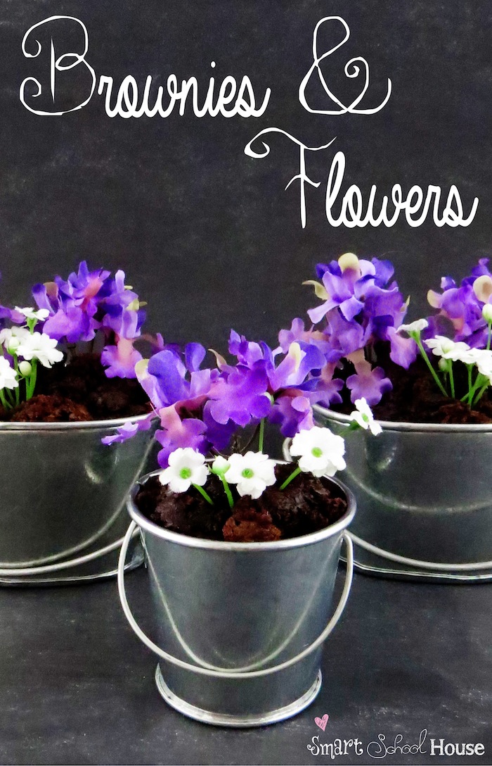 Brownie Buckets are #brownie crumbles planted inside small galvanized buckets topped with silk flowers. A pretty way to entertain with sweets! #dessert #diy
