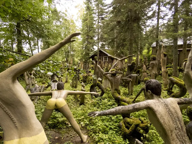 Mossy yoga people in southeastern Finland created by Veijo Rönkkönen