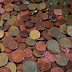 ¿Se debe limpiar las monedas para conservarlas?