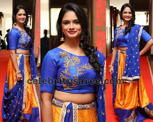 orange lehenga with blue blouse