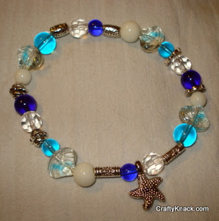 The Crafty Knack: Simple Beaded Bracelet in Water Hues with Charm